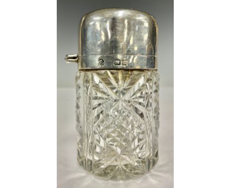 An Edwardian silver hobnail cut scent bottle, hinged cover enclosing a stopper, 7cm high, William Hutton &amp; Sons Ltd, Birm