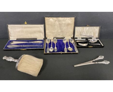 A Victorian silver handled brush, embossed with mask heads and foliage, London 1890; silver handles glove stretcher, marks wo