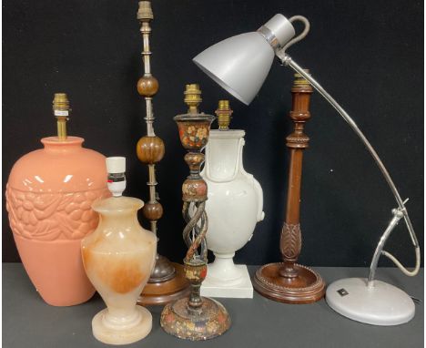 A Kashmiri table lamp, typically decorated in polychrome and gilt with flowers, open-twist pillar, circular base, 45cm high, 