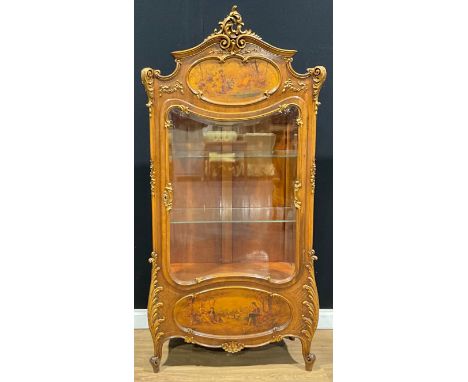 A Louis XV style parcel-gilt walnut vitrine, the panels decorated in the vernis Martin taste, glazed door enclosing two shelv