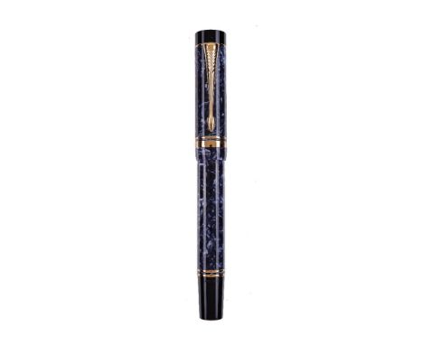 Parker, Duofold, a blue marbled fountain pen, the cap with gilt arrow clip and double cap band, the medium nib stamped 18K 75