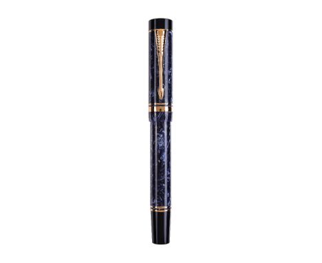 Parker, Duofold, a blue marbled fountain pen, the cap with gilt arrow clip and double cap band, the medium nib stamped 18K 75