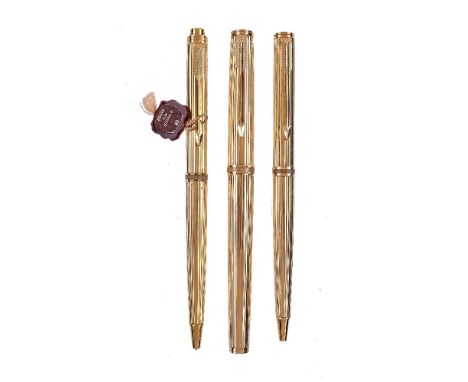 Parker, Premier, an 18 carat gold fountain pen, ball point pen and propelling pencil, import marks for London, the fountain p