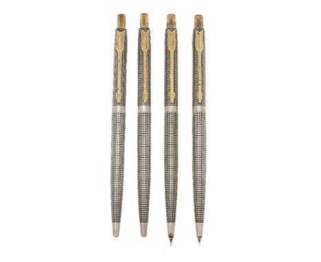 Parker, Classic Cicele, two silver coloured ballpoint pens and two propelling pencils, with gilt arrow clips