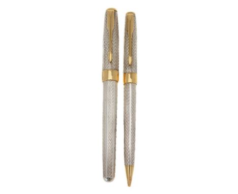 Parker, Sonnet Fougere, a silver roller ball pen and propelling pencil, with gilt arrow clips and London import marks