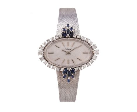 Faberge,   Lady's 18 carat white gold, diamond and sapphire bracelet watch   Movement: Cal. ETA 351, manual wind, 17 jewels  