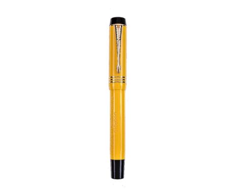 Parker, Duofold Mandarin, a limited edition yellow fountain pen, no. 0009/10,000, the cap with gilt arrow clip and triple cap