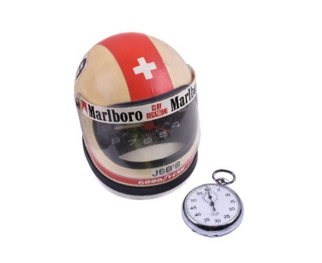 Heuer, Clay Regazzoni, Racing helmet desk clock, circa 1975   Movement: Mechanical quartz   Case: Plastic   Signed: Dial   Ac