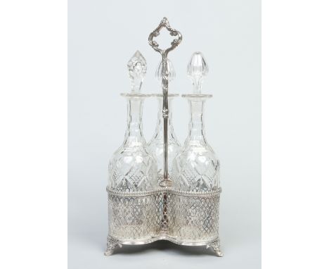 A silver plated three bottle tantalas of pierced trefoil form raised on cast bracket feet and with three cut glass decanters,
