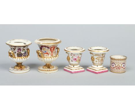 An 18th century Derby desk sander gilded and enamelled with a Classical band along with two 19th century Derby inkwells and a