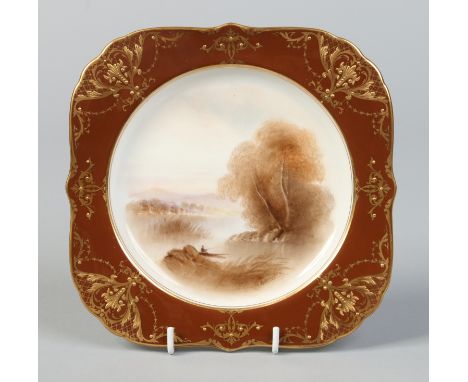 A Royal Worcester square cabinet plate by Raymond Rushton. Painted with a sepia river landscape under a brown and raised gilt