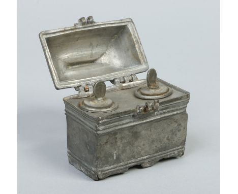 An 18th century French holy oil casket of sarcophagus form raised on a bracket shaped apron and housing two lidded containers