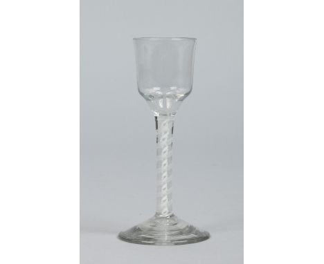 An 18th century wine glass with plain bowl raised on a double series opaque twist stem, 14.75cm.