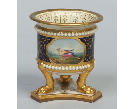 A Worcester Flight Barr & Barr neo Classical style cylindrical vase raised on moulded paw feet over a triform base. Ground in