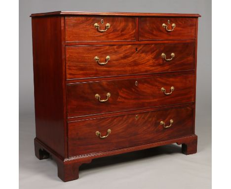 A George IV figured mahogany straight fronted two over three chest of drawers. With oak drawer linings, cock beading, origina