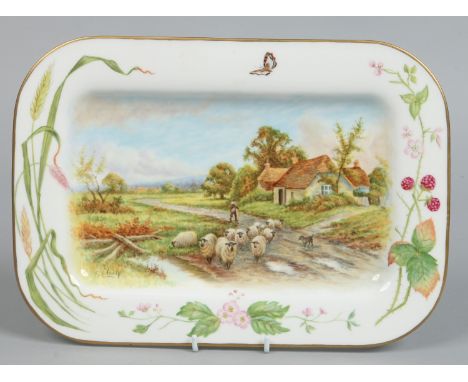 Frank Clark (Royal Worcester Artist), a large china dish decorated in coloured enamels with a Welsh rural scene with a cottag