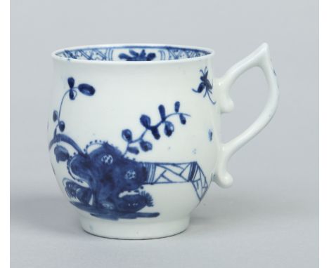 A Worcester bell shaped coffee cup with scrolling wishbone handle. Painted in underglaze blue with the Warbler pattern. Workm