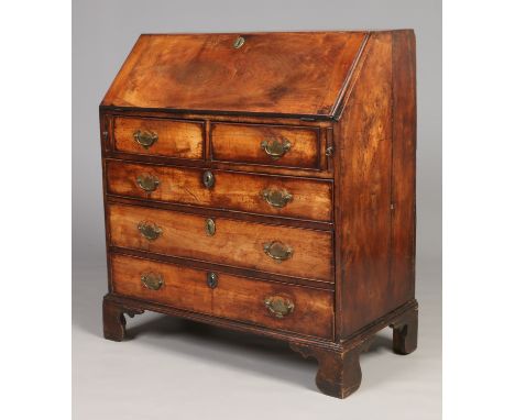 A George III mahogany bureau. With fitted interior, cock beading and raised on bracket feet, 1m 2cm high, 90cm wide, 49cm dee