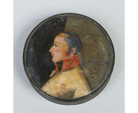 A Victorian circular lacquered papier mache snuff box. Painted to the cover with a portrait of Napoleon, 9cm diameter.    Con