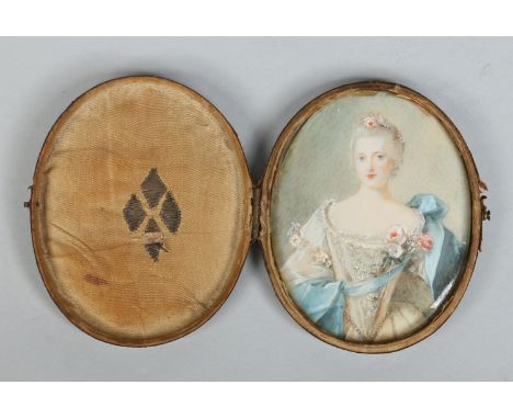 An 18th century ivory portrait miniature of a noblewoman, with a blue sash and pink roses, 7.5cm.   Condition Report. To be u
