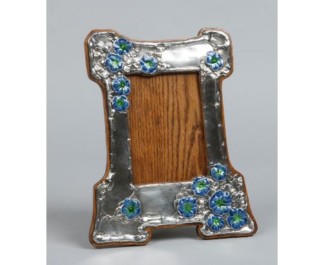 A silver Art Nouveau eizel photograph frame by William Hair Haseler. Decorated in relief with stylized prunus blossom heighte