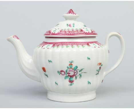 A Newhall teapot of rare fluted ogee form. Painted with flowers and puce cell borders, pattern 273, c1795, 19cm.   Condition 