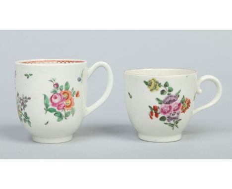 Two Worcester coffee cups; one with grooved loop handle and decorated in coloured enamels with lavish flower sprays and a dot