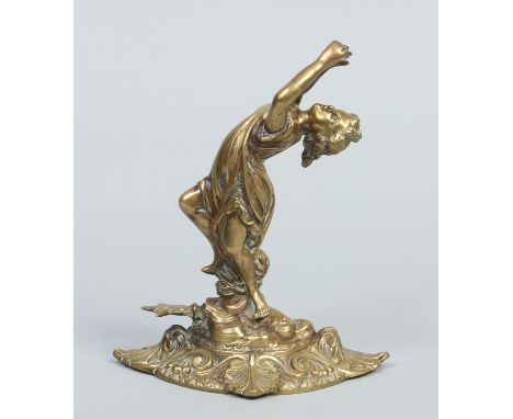 A Victorian cast brass figural table lighter. Formed as a maiden raised on a lozenge shaped base and with star terminal to th