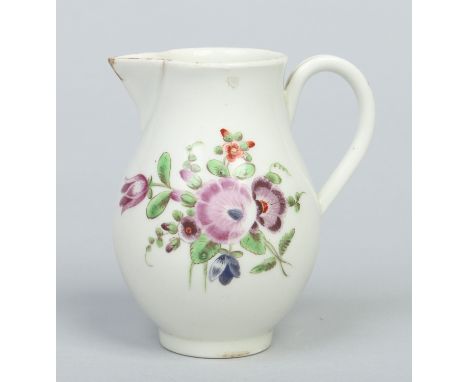 A Worcester sparrow beak cream jug with grooved loop handle. Painted in coloured enamels with a flower bouquet and scattered 