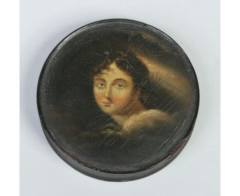 A Victorian circular lacquered papier mache snuff box. Painted to the cover with the portrait of a maiden, 9.5cm diameter.   