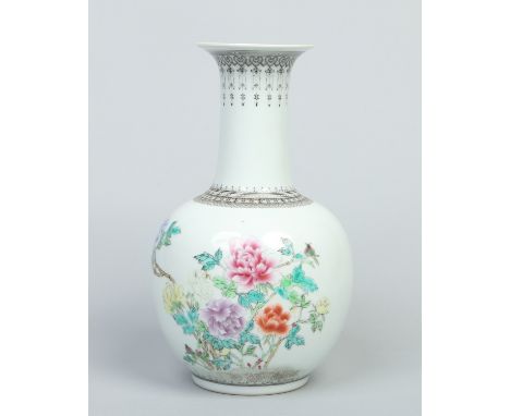 A Chinese Republic period famille rose bottle vase decorated with peonies and a poem inscription, 30cm.   Condition Report. T