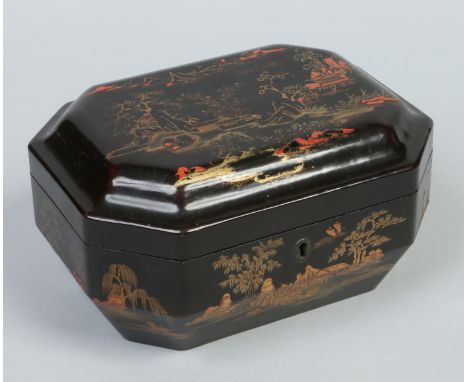 A 19th century Chinese lacquered tea caddy of canted rectangular form. Decorated in gilt and red with landscapes and with eng