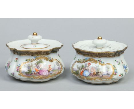 A Meissen inkwell and desk sander. Each with gilt cartouches painted with Watteauesque scenes and with scattered sprigs. Unde