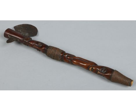 An African tribal carved ivory axe decorated with figures, a cowrie shell and bound with copper wire, 38cm.   Condition Repor