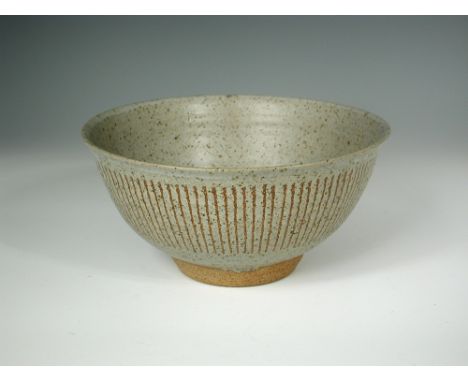 Helen Pincombe (British, 1908-2004), a large stoneware bowl, with dolomite glaze and incised vertical line decoration, impres