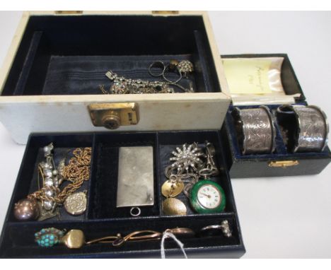 A jewel box containing a quantity of hallmarked gold, gemset and costume jewellery to include a sapphire and pearl ring, amet