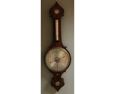 A 19th century rosewood onion top wheel barometer, the silvered 12inch (30.5cm) dial signed 'D. Fagioli & Son, Clerkenwell', 