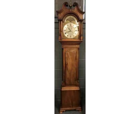 An 18th century North Country 30 hour longcase clock, Hugh Lough, Penrith, the mahogany case with swanneck pediment, above 12