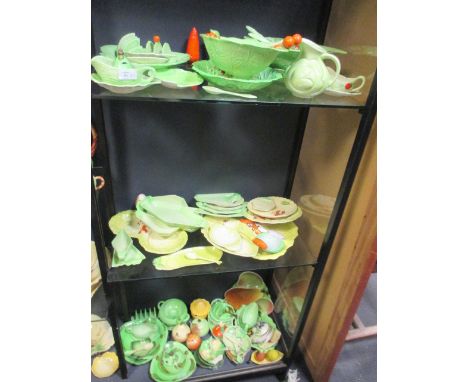 A large collection of Carlton Ware Lobster and Tomato pattern dishes, serving utensils, salt and pepper shakers, etc  