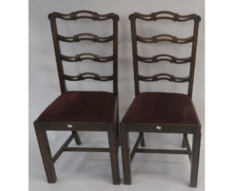 A lot of eight 20th century mahogany ladder back dining chairs (8) Condition Report: Available upon request