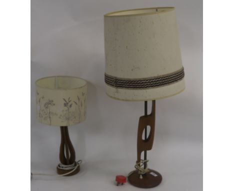 Two mid century teak table lamps with shades (2) Condition Report: Larger lamp is 85cm high with shade and is in good general