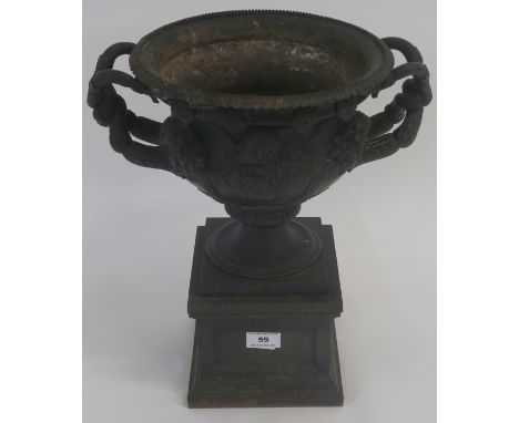 A cast iron reproduction of the Warwick Vase, 40cm high, 34cm wide and 27cm deep Condition Report: Vase has some sign of ligh