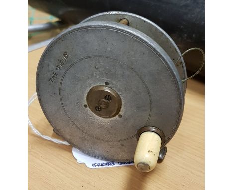 A Hardy "Field" 31/8" contracted trout fly reel, bearing rod in hand trademark CONDITION REPORTS Numerous light surface scrat