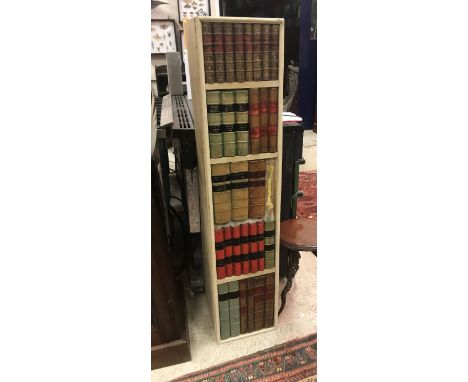 A modern gun cabinet cover as a book case