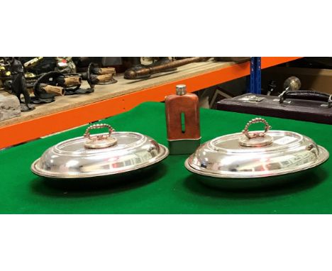 A pair of plated entrée dishes by Asprey &amp; Co stamped to base together with a hip flask