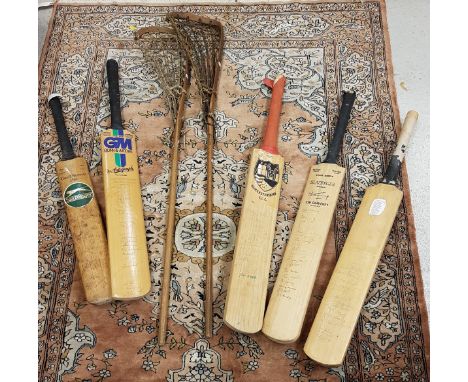 A collection of four various signed cricket bats including a Slazenger Geoff Boycott bat signed by Geoff Boycott and David Go