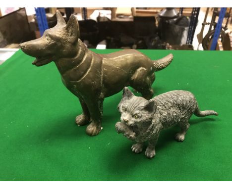 A cold painted bronze figure of a cat with mouse prey together with a brass figure of a German Shepherd