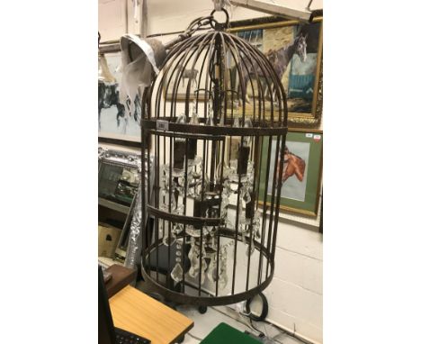 A modern wrought iron "bird cage" eight light electrolier