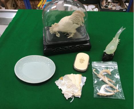 A collection of ornamental ivory and other wares to include ivory chicken, Chinese style carved mother-of-pearl notepad, jade