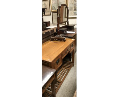 A modern Chinese cherry wood desk together with a rosewood and brass standard lamp (polescreen base)